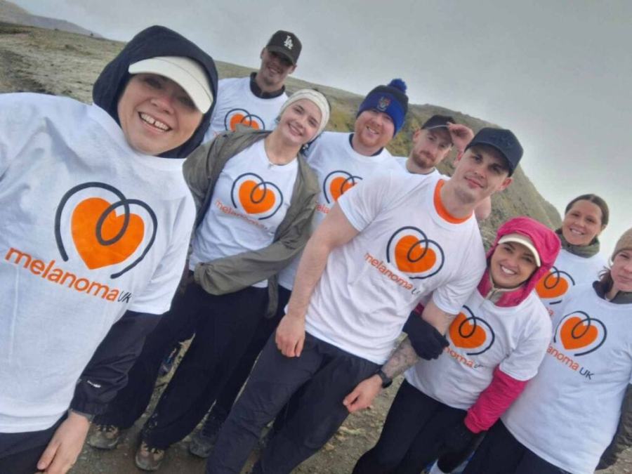 Protecting skin from sun damage during outdoor activities for melanoma awareness.