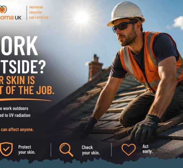 Outdoor worker inspecting roof for sun safety and melanoma risk.